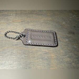 COACH Leather Tag with purple stitching